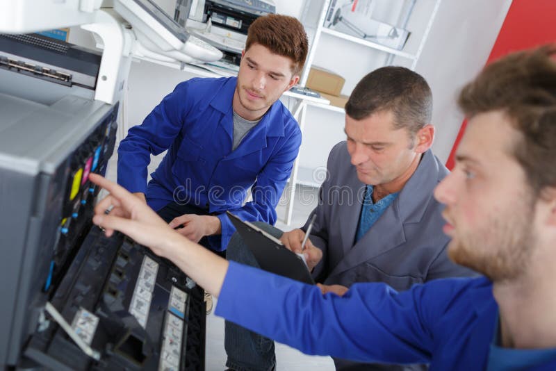 Group Apprentice Mending Printer Stock Photo Image of replace