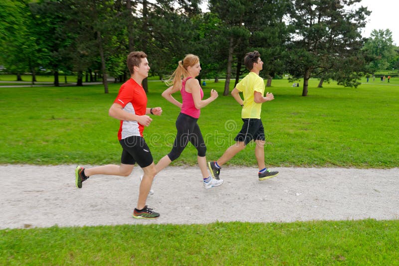 Group of athletes jogging stock image. Image of black 32762197