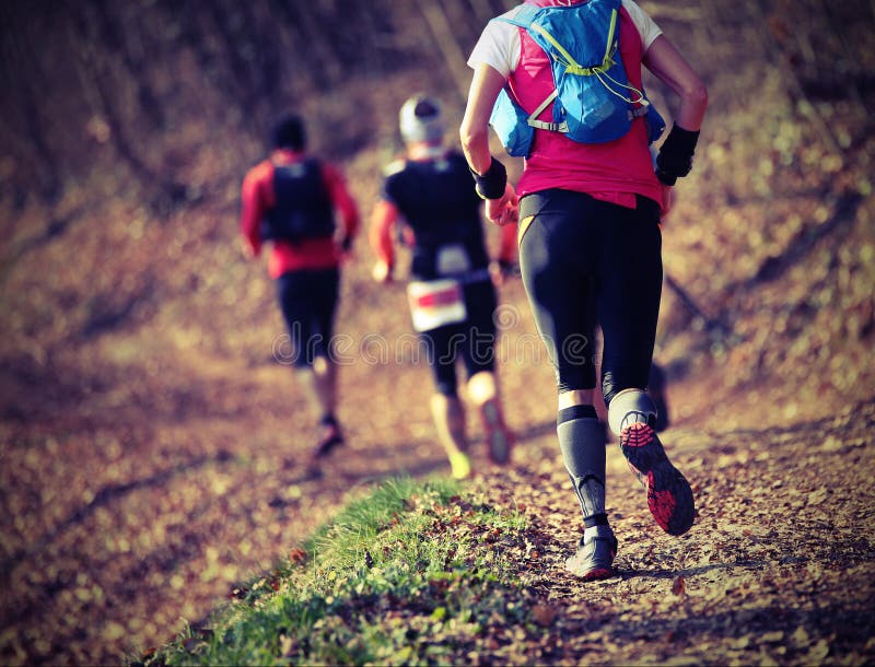 Group Of Athletes Running The Country Race Stock Image Image of