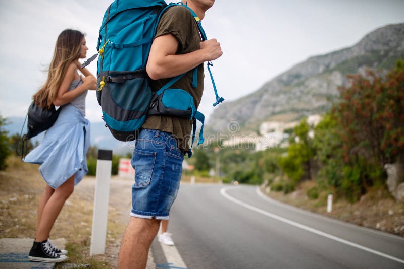 Group of backpackers and young friends traveling and having fun together royalty free stock photo Group of backpackers and young friends traveling and having fun together royalty free stock photo