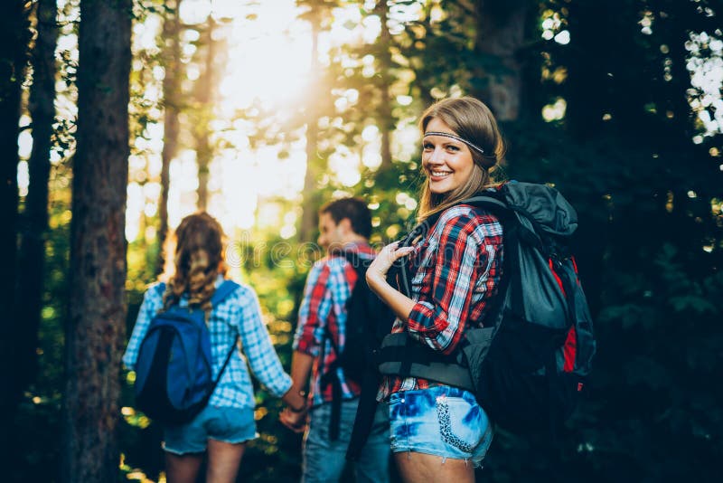 Group of Backpacking Hikers Going for Forest Trekking Stock Image ...