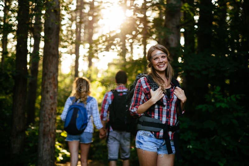 Group of Backpacking Hikers Going for Forest Trekking Stock Photo ...