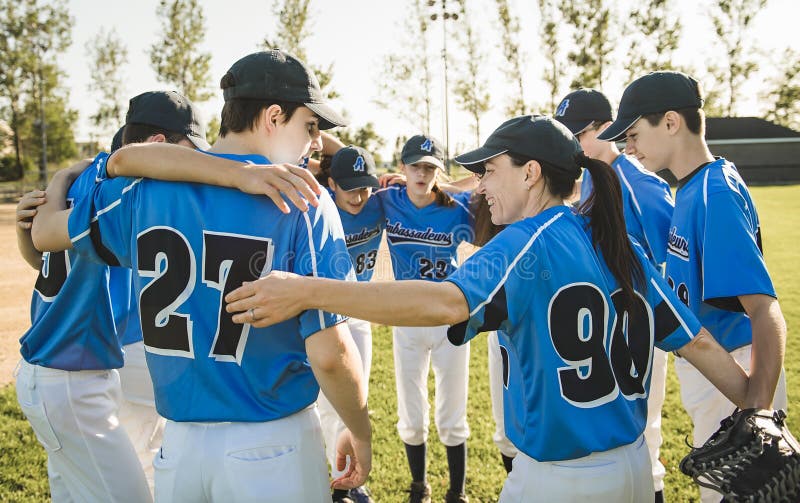 Group of Baseball Players Standing Together on the Playground Stock