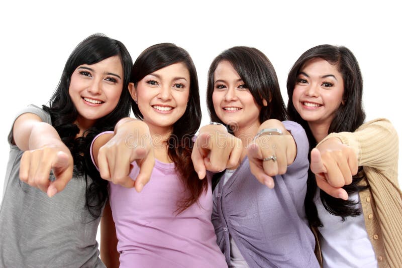 Group of beautiful women pointing to camera