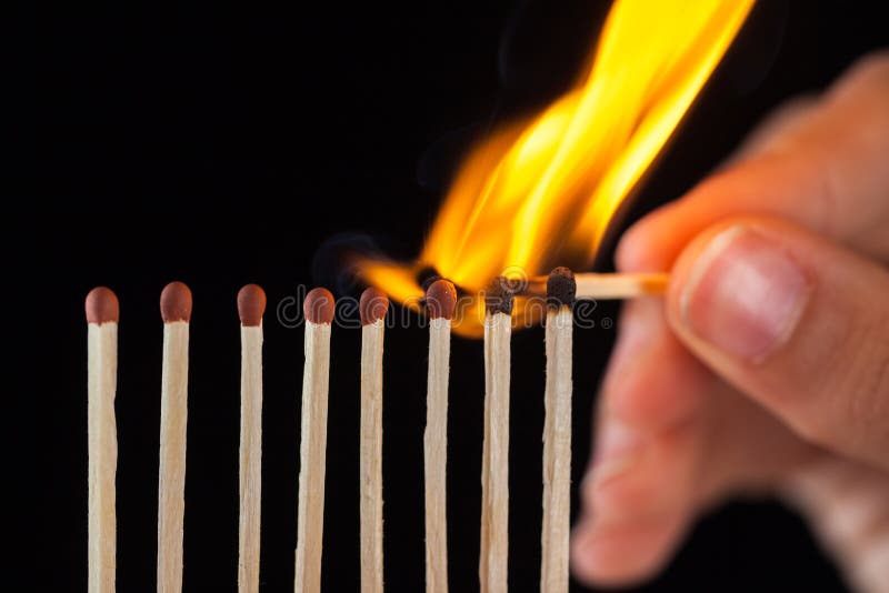 Group of Burn and Unburned Matches, on Black Background Stock Image