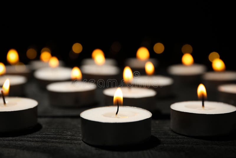 Group of burning candles on background, close up royalty free stock image