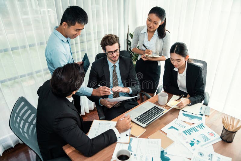 Group of business analyst team analyzing financial data report. Habiliment stock photography
