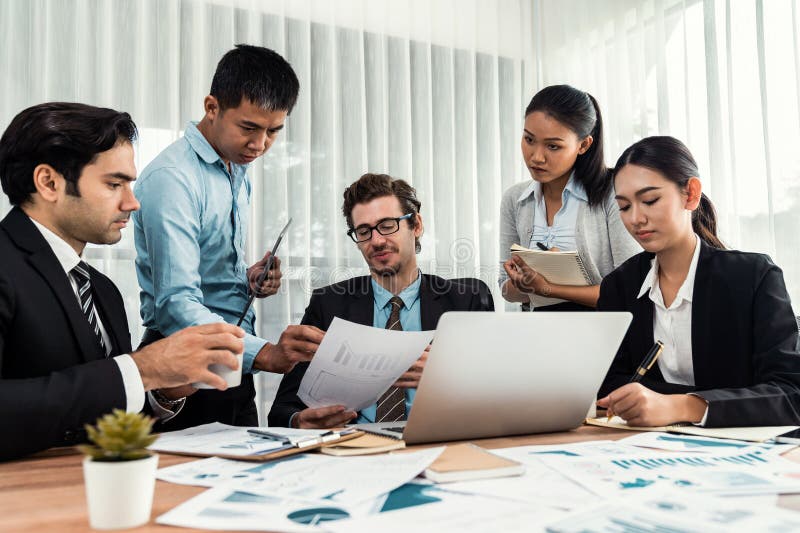 Group of business analyst team analyzing financial data report. Meticulous stock photos
