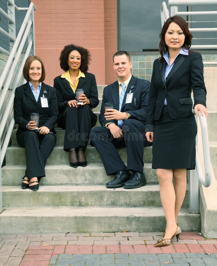 Group Of Business People In Front Of Building