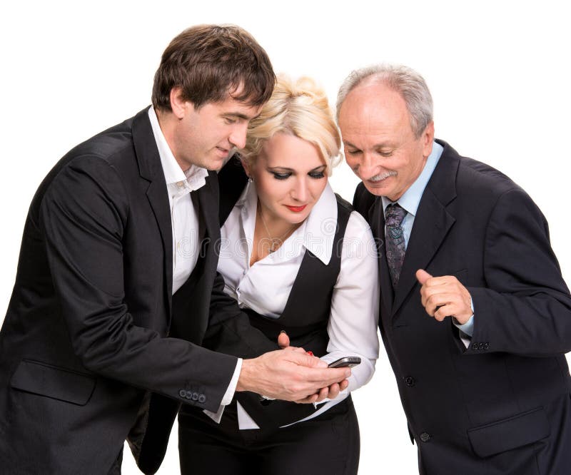 Group of Business People Looking at a Cell Phone Stock Image Image of