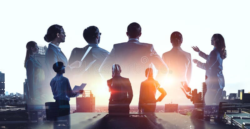 Group of business people outlines with lit background stock image