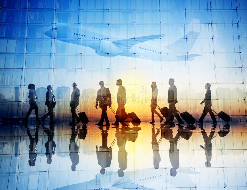 Group of Business Travelers Walking in an Airport stock image
