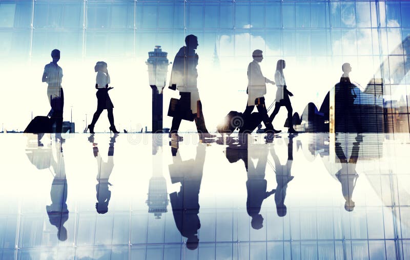 Group of Business Travelers Walking in the Airport