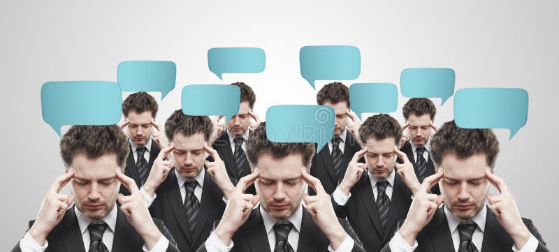 Group of businessman with social chat sign and speech bubbles. Thinking man representing a social network. Conceptual image of a open minded man.On a gray background. Group of businessman with social chat sign and speech bubbles. Thinking man representing a social network. Conceptual image of a open minded man.On a gray background
