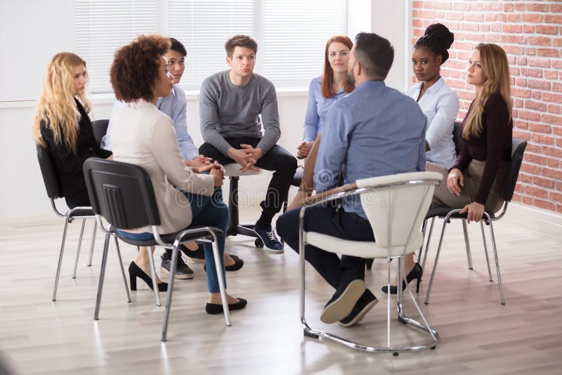 Group Of Businesspeople Sitting On Chair stock photos Group Of Businesspeople Sitting On Chair stock photos