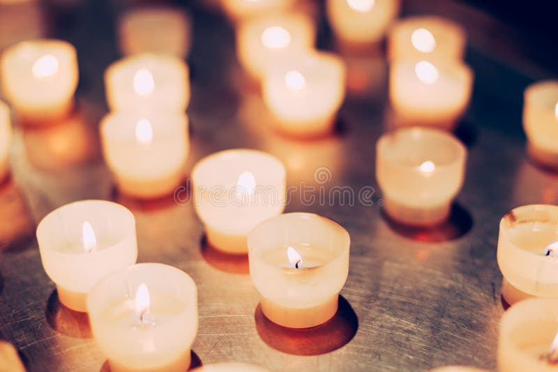 Group Of Candles In Church. Candles Light Background stock photography