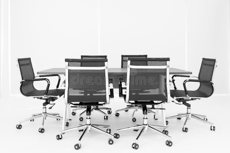 Group of chaira around table in meeting room stock image Group of chaira around table in meeting room stock image