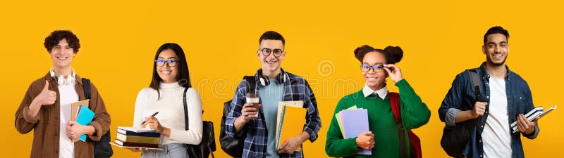 Group of cheerful multiethnic students carrying backpacks and books over yellow background