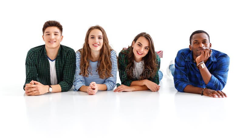 Group of cheerful young people men and women isolated on white background