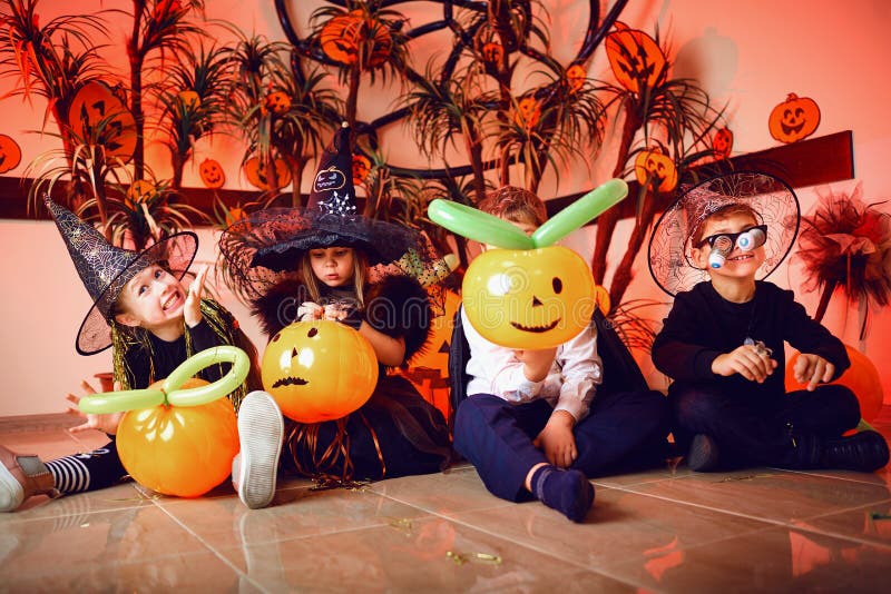 A group of children in costumes on a Halloween holiday royalty free stock image A group of children in costumes on a Halloween holiday royalty free stock image