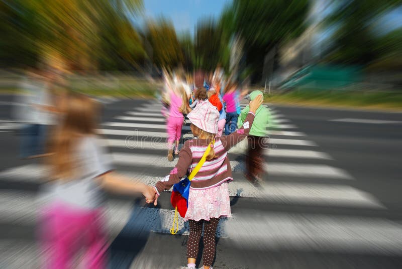 Group of children crossing the street stock photos Group of children crossing the street stock photos
