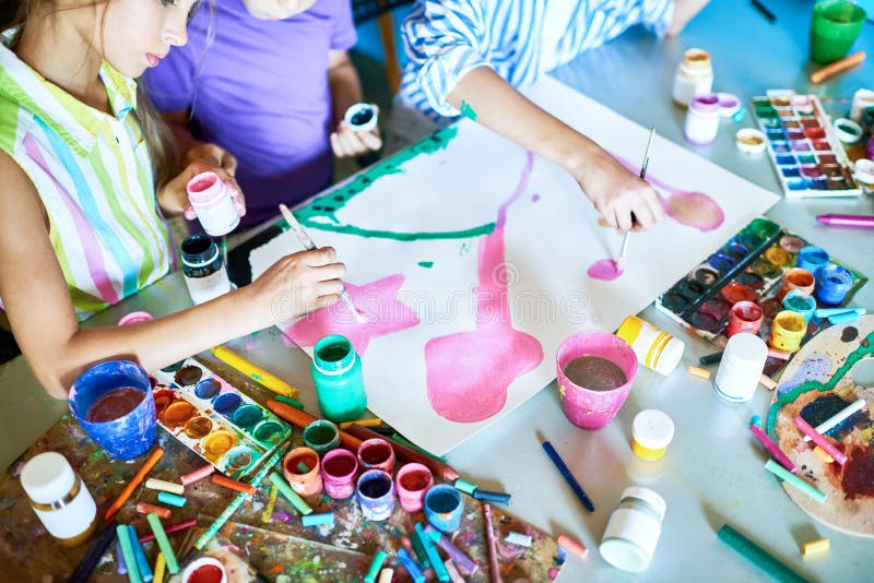 Group of Children Painting Together stock photo Group of Children Painting Together stock photo