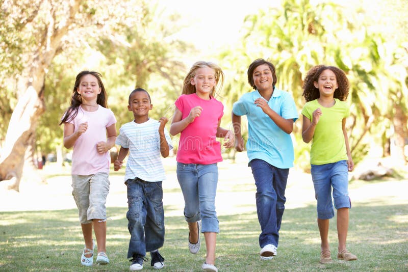 Group Of Children Running Through Park royalty free stock image Group Of Children Running Through Park royalty free stock image