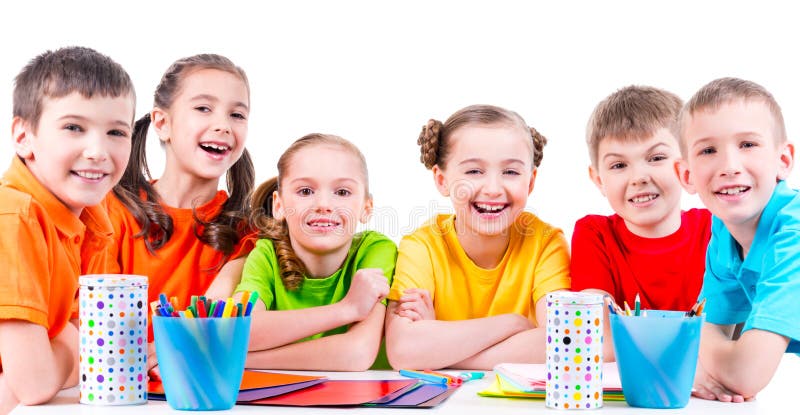 Group of children sitting at a table.