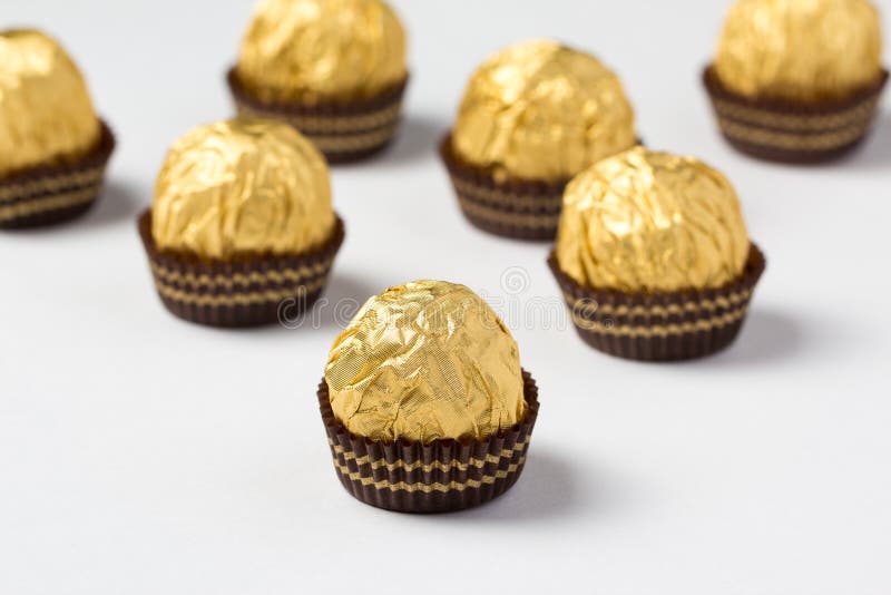 135 Chocolate Candies Gold Wrapping Stock Photos Free & RoyaltyFree