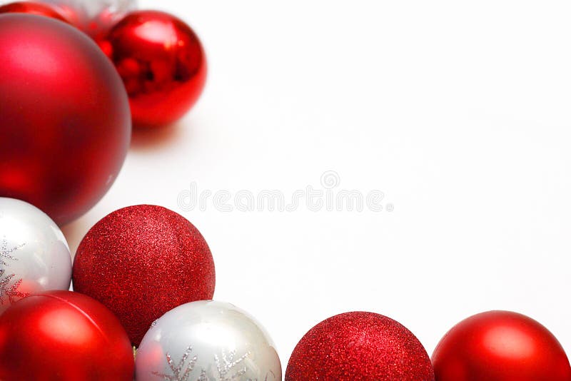 Group of Christmas Ornaments Framing White Background