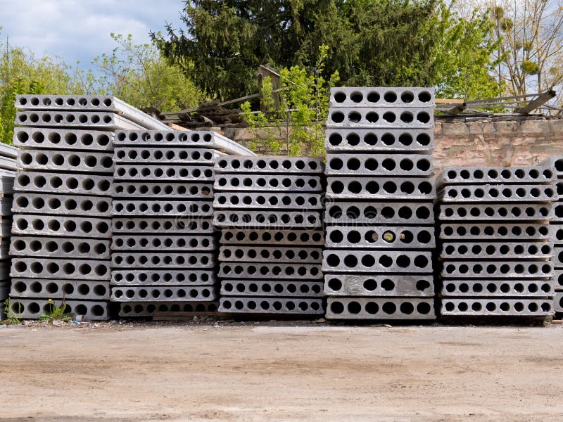 Group of Concrete Panels Isolated on the Construction Site. Stock Photo