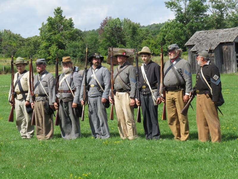 Civil War Re-enactment Soldier Firing Rifle. Editorial Stock Photo ...