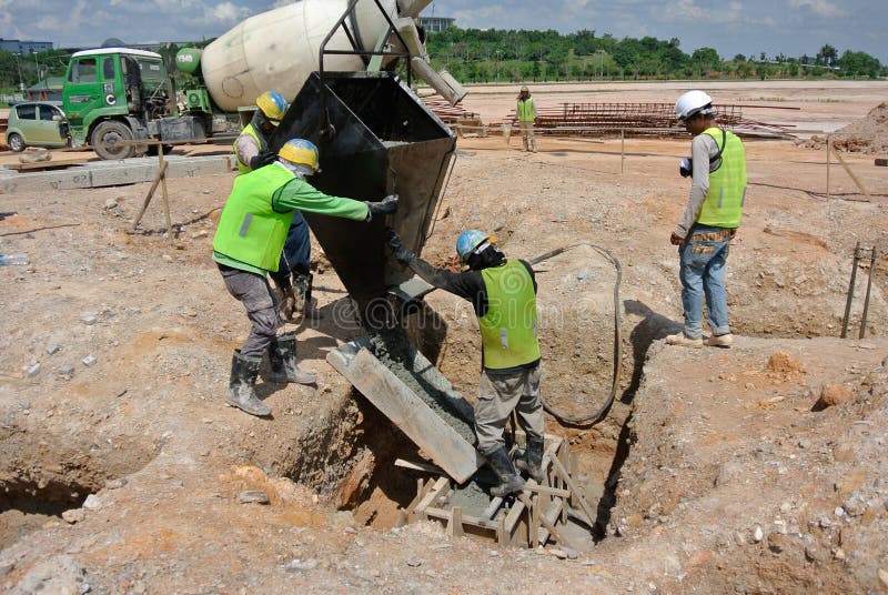 Group of construction workers casting pile cap royalty free stock images Group of construction workers casting pile cap royalty free stock images