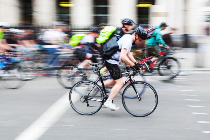 Group of cyclists in the city in motion blur