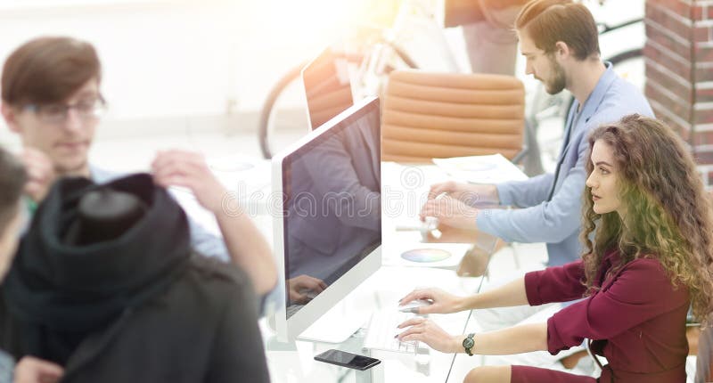 Group of designers working in a modern office royalty free stock image