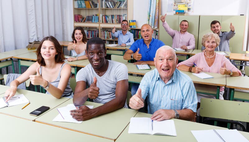 Group different ages satisfied results exam stock photography.