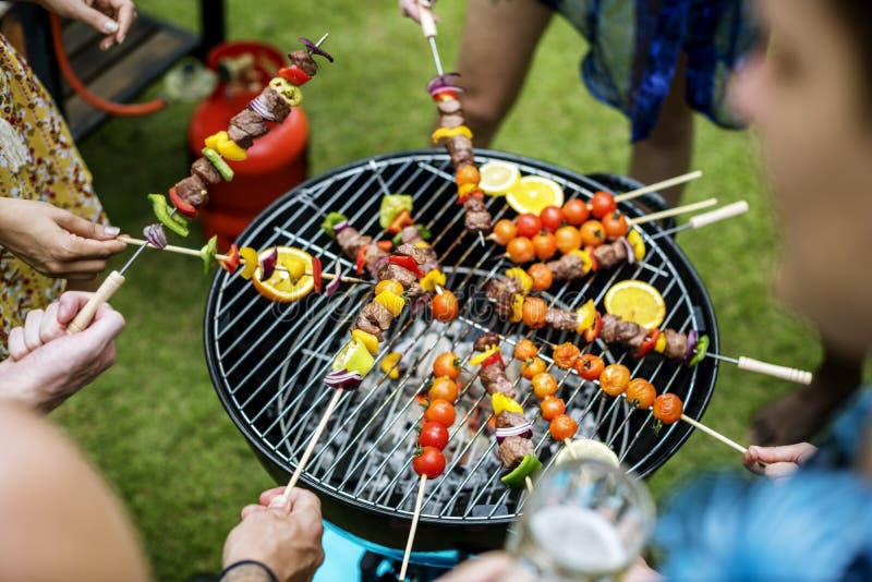 Group of Diverse Friends Grilling Barbecue Outdoors Stock Image Image