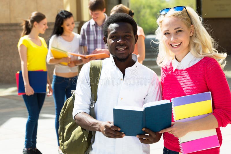 Group of diverse students outside royalty free stock photos