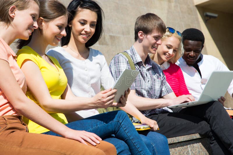 Group of diverse students outside stock image