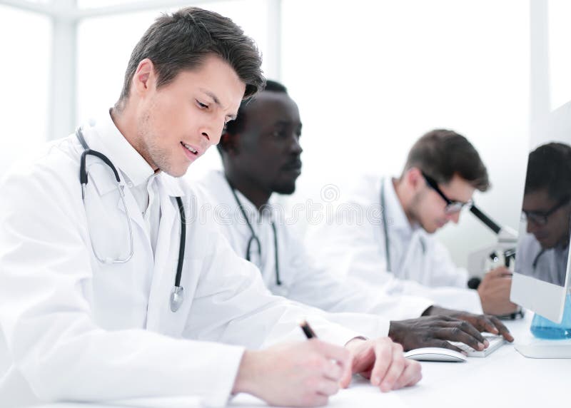 Group of Doctors Working in the Hospital Laboratory Stock Photo Image