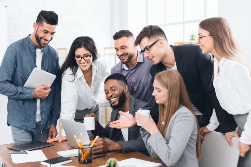 Diverse Employees Gather Together At Office Room Listening