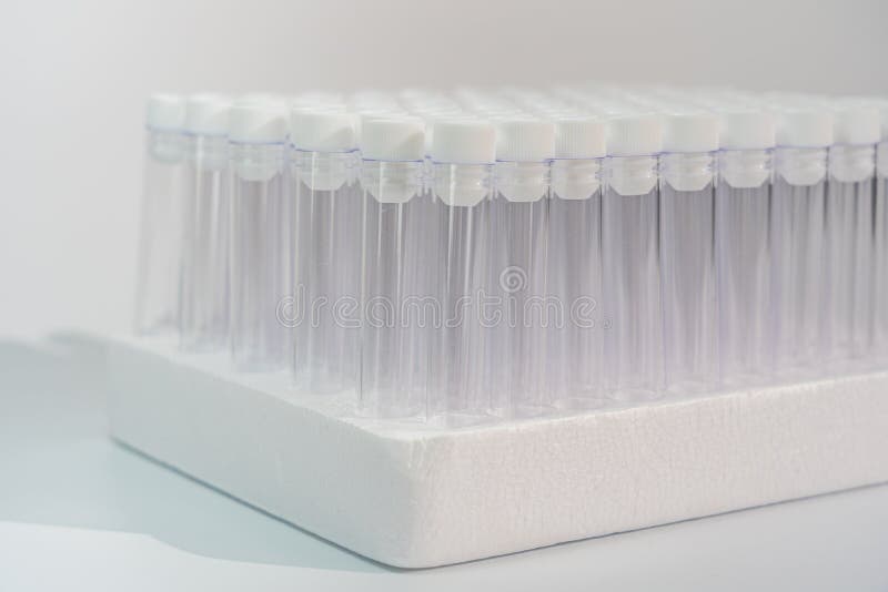 Group of Empty Vacuum Venipuncture Test Tubes in Laboratory Stock Photo