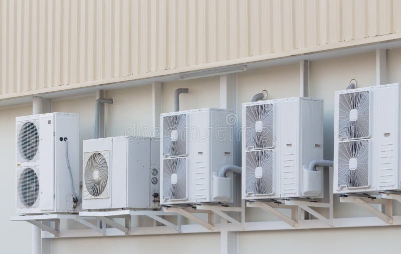 Group of External Air Conditioning and Compressors Units Outside a Building, Air Conditioner