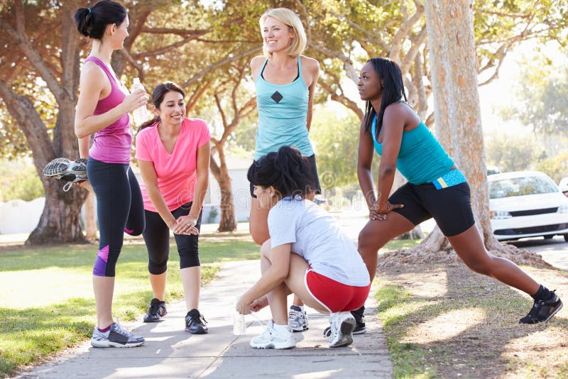 Group of Female Runners Warming Up before Run Stock Image - Image of ...