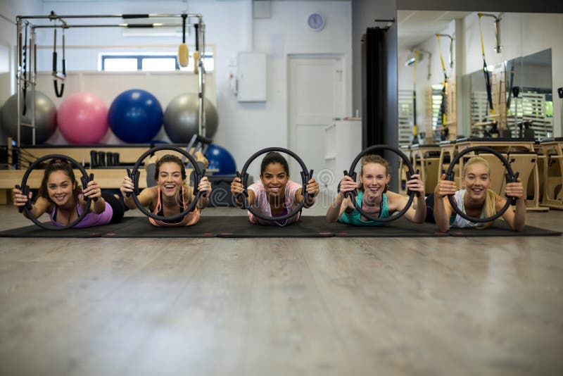 Pilates Ring and Exercise Mat Kept on Wooden Floor Stock Photo Image