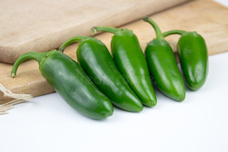 Group of fresh, healthy jalapeno peppers stock image