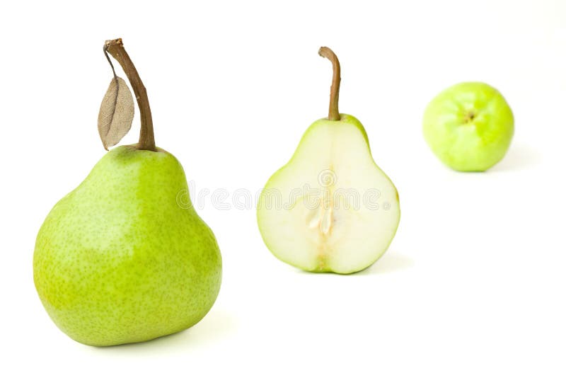 Group Of Fresh Pears With One Halved