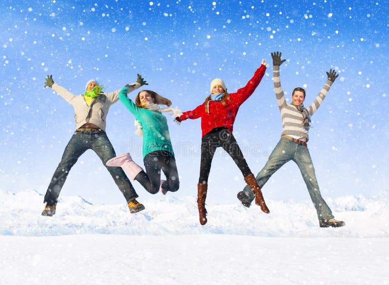 Group Of Friends Jumping In The Snow Stock Image - Image of bonding ...