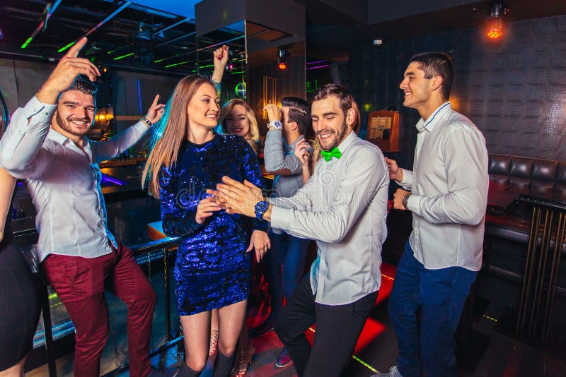 Friends Partying in a Nightclub Stock Photo - Image of girl, group ...