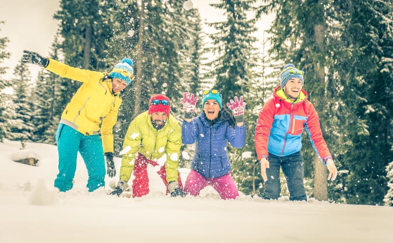 Group of Friends Playing on the Snow Stock Image - Image of girl, high ...